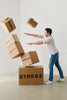Man pushing boxes where is written stress, problems and anxiety